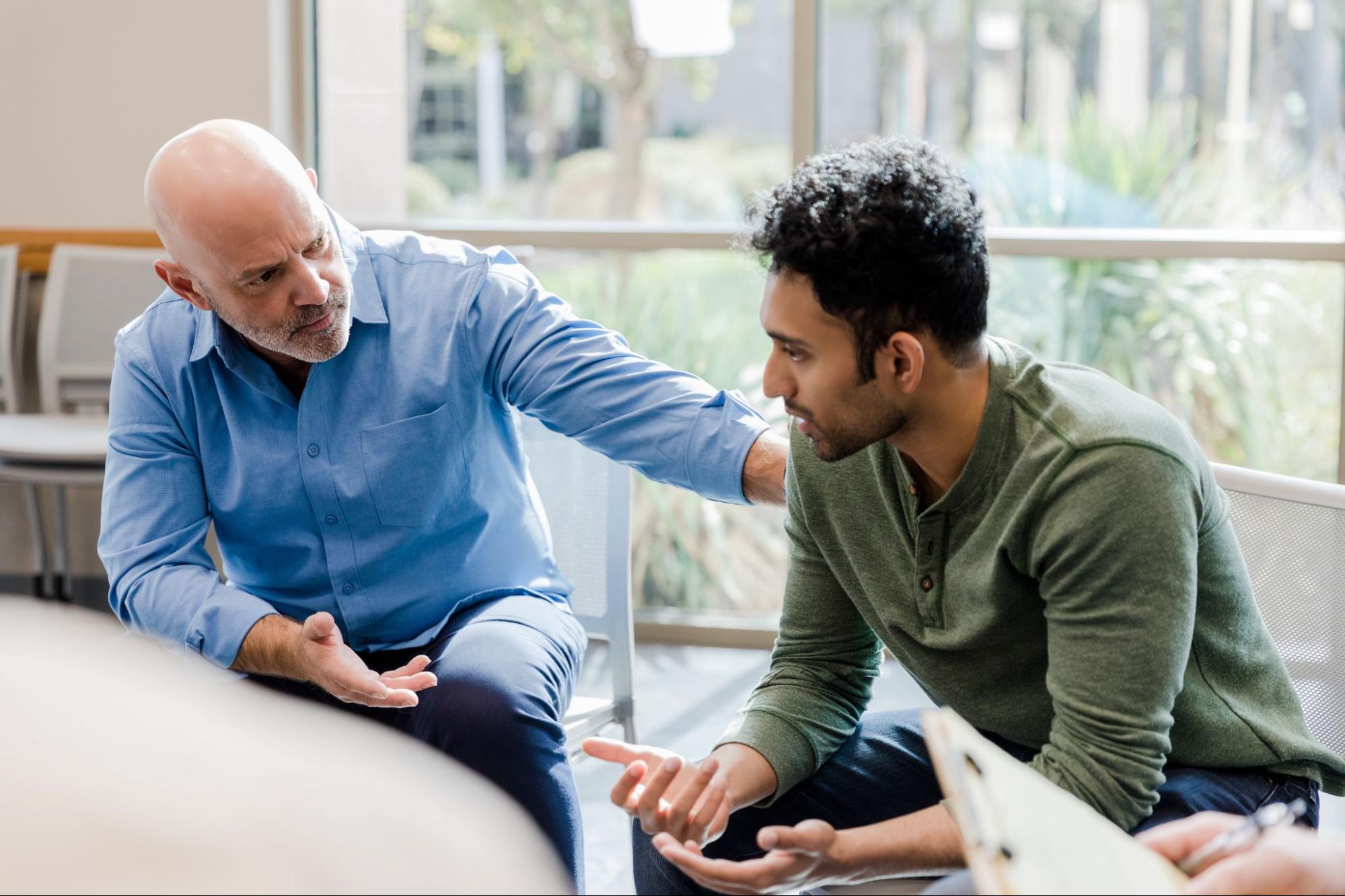 Man engaged in serious conversation